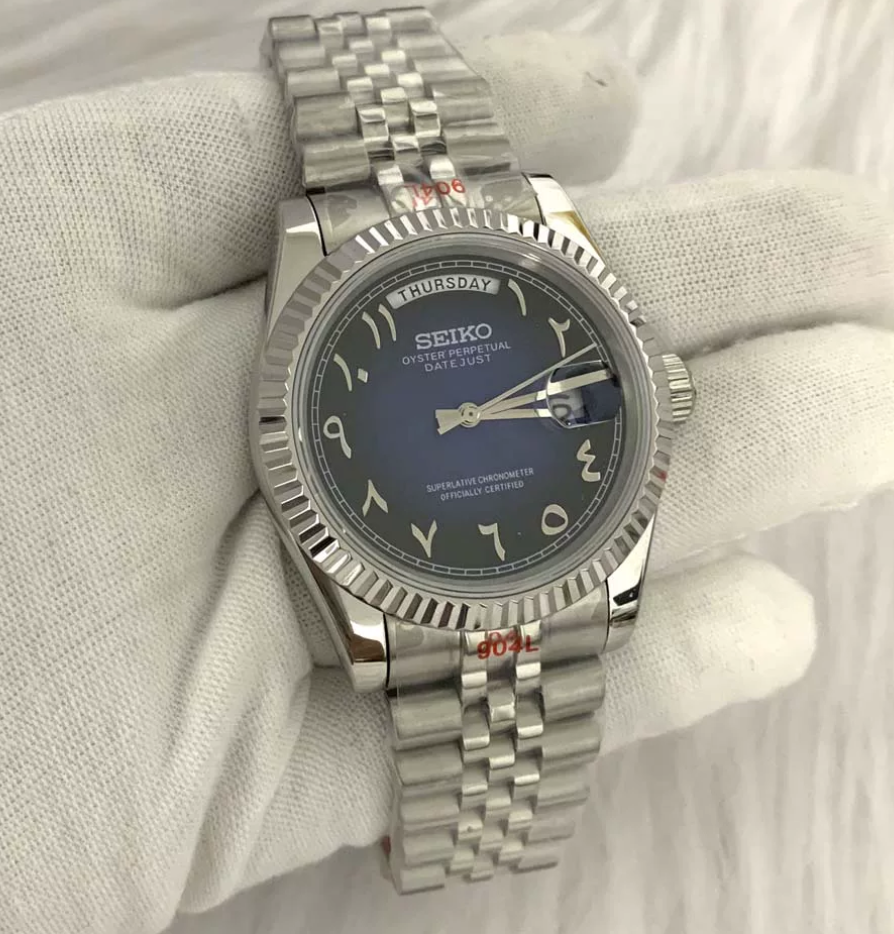 Day-Date Midnight — Fluted bezel, jubilee bracelet, midnight blue dial